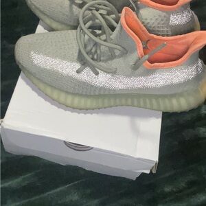 Yeezy Gray and Orange Athletic Shoes